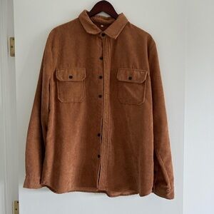 Brown corduroy look shirt with a missing button